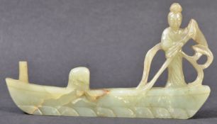 ANTIQUE CARVED JADEITE FIGURE OF GUANYIN ON LOTUS PETAL BOAT