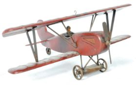 20TH CENTURY RUSTIC HAND PAINTED MODEL OF A BIPLANE