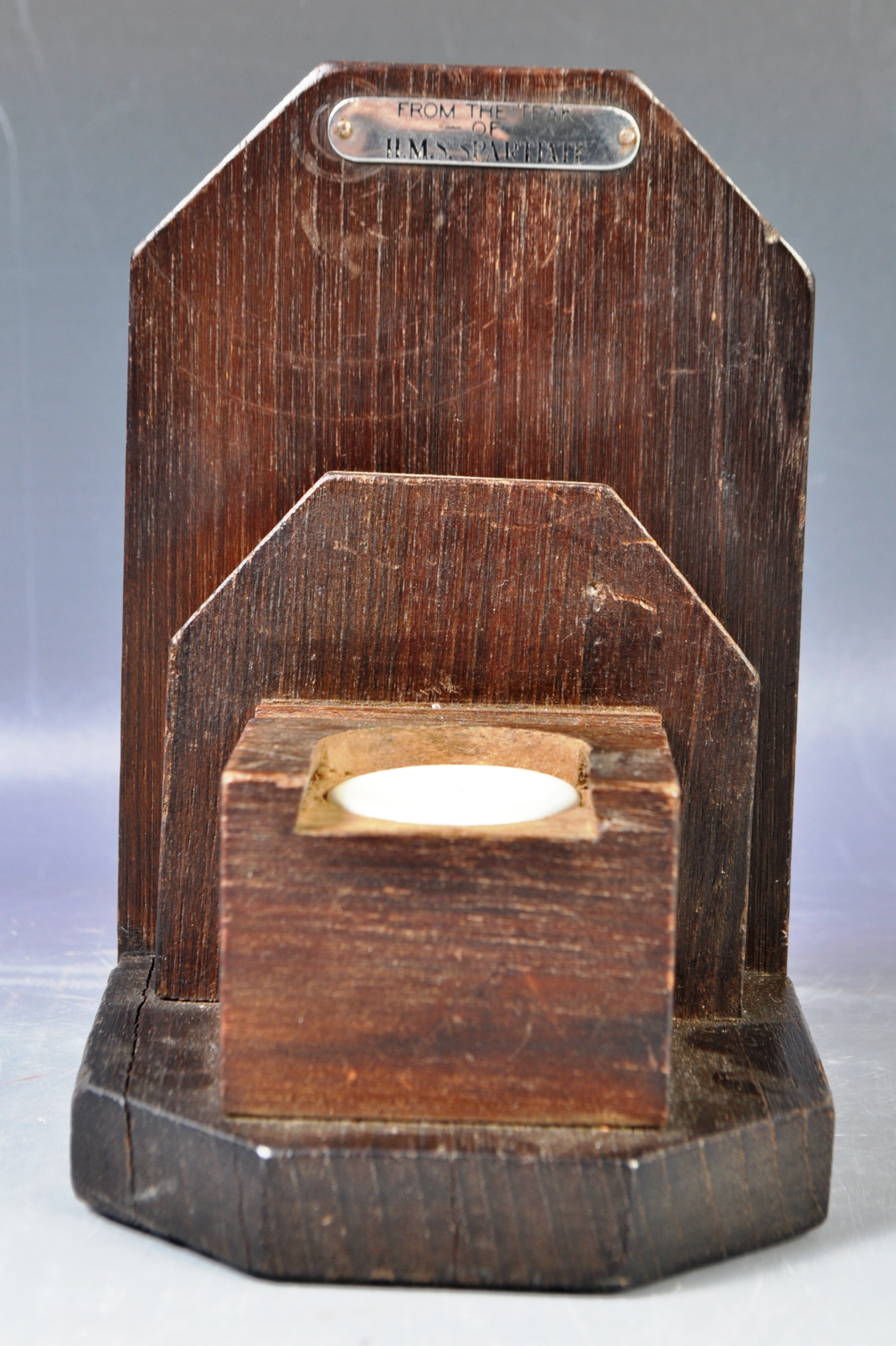EARLY 20TH CENTURY TEAK HMS SPARTIATE COMMODE INKWELL
