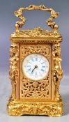 ANTIQUE FRENCH MINIATURE ORMOLU CARRIAGE CLOCK