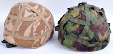 BRITISH ARMY - TWO 20TH CENTURY MILITARY HELMETS