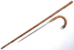 EARLY 20TH CENTURY MIDDLE EASTERN BAMBOO SWORD STICK