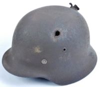 ORIGINAL WWII GERMAN M35 STAHLHELM BATTLE DAMAGED HELMET