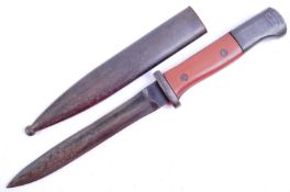 A WWII Second World War Third Reich Nazi German trench combat knife / boot knife styled on an SG84/