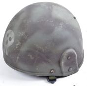 20TH CENTURY BRITISH ARMY 1989/90 NATO HELMET WITH GRAFITTI