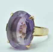 18CT GOLD AND AMETHYST DRESS RING
