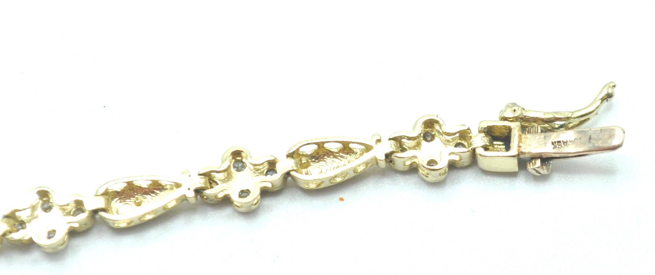 STAMPED 10K GOLD AND DIAMOND BRACELET. - Image 7 of 8