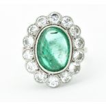 PLATINUM EMERALD AND DIAMOND CLUSTER RING