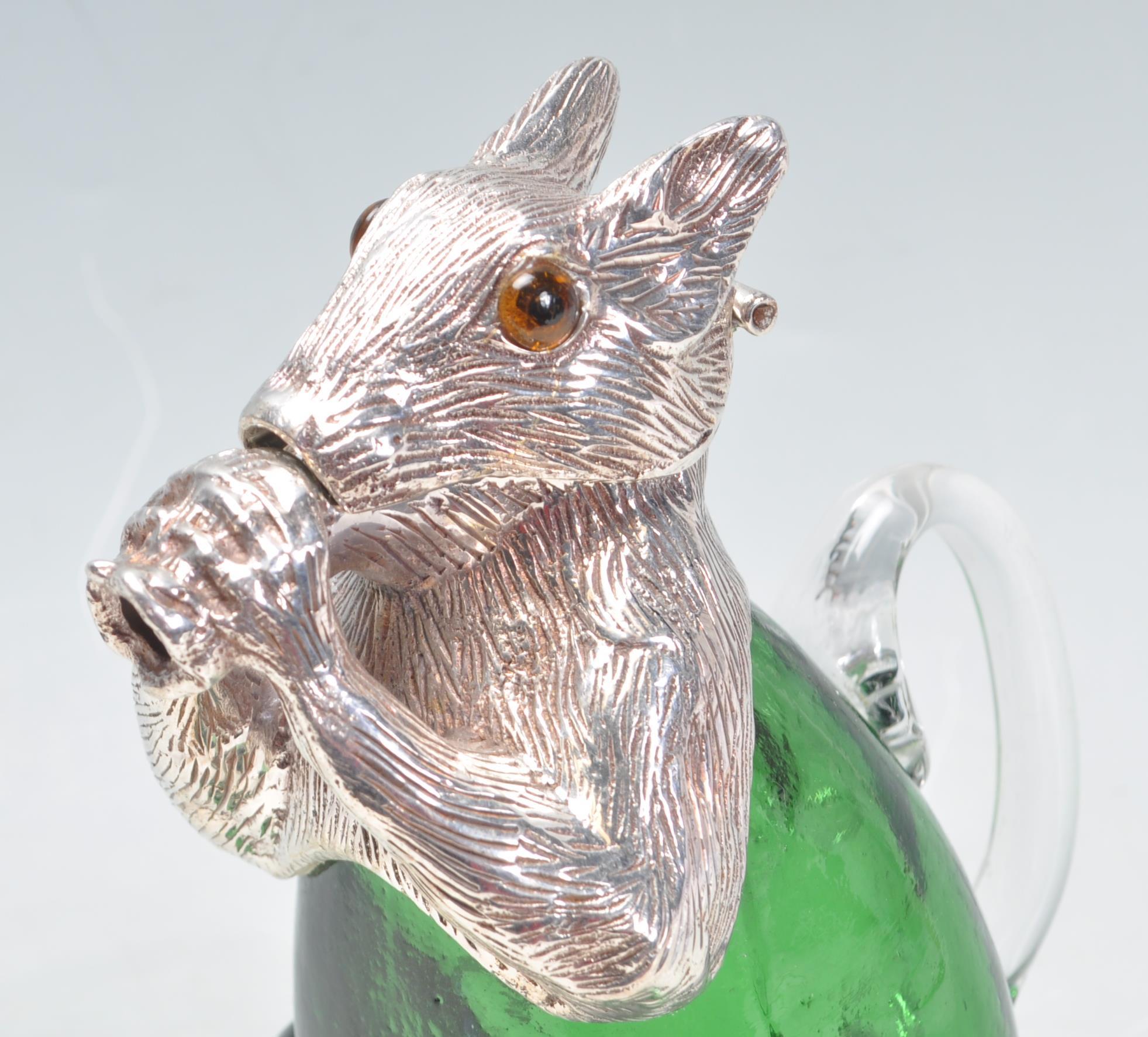 SILVER PLATE AND EMERALD GLASS SQUIRREL CLARET POURER. - Image 2 of 7