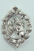 STAMPED STERLING SILVER HORSE BROOCH.