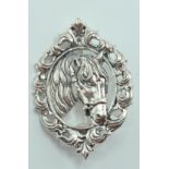 STAMPED STERLING SILVER HORSE BROOCH.