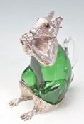 SILVER PLATE AND EMERALD GLASS SQUIRREL CLARET POURER.