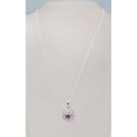 STAMPED 925 SILVER PENDANT NECKLACE WITH CENTRAL PURPLE STONE AND CZ'S.