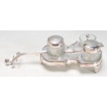 SILVER PLATED CONDIMENT CRUET SET IN THE FORM OF A CELLO.