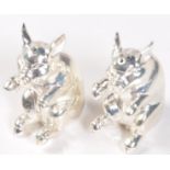PAIR OF SILVER PLATED CONDIMENT SALT AND PEPPER SHAKERS IN THE FORM OF PIGS.