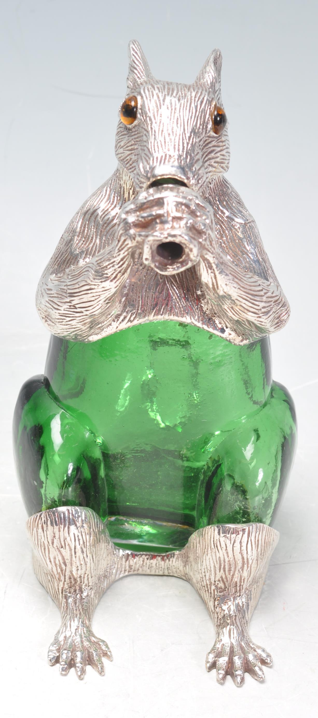 SILVER PLATE AND EMERALD GLASS SQUIRREL CLARET POURER. - Image 3 of 7
