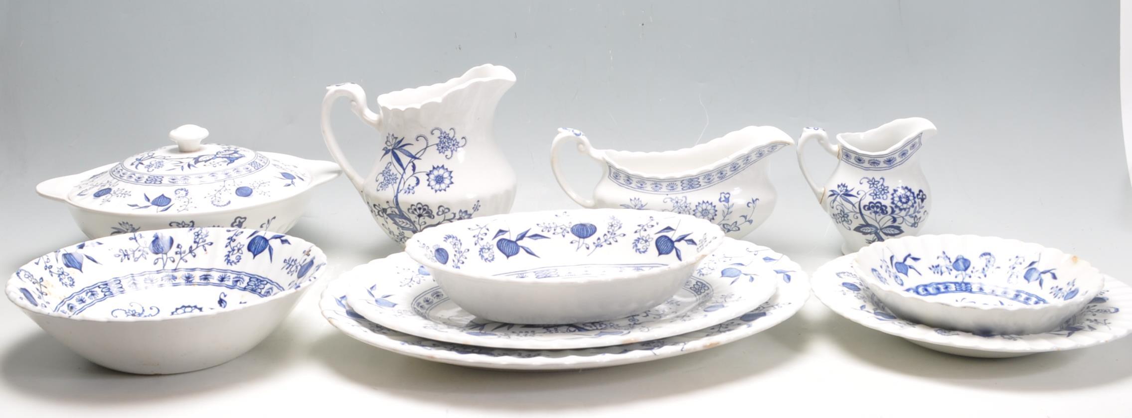 BLUE AND WHITE DINNER SERVICE BY J & G MEAKIN IN BLUE NORDIC PATTERN