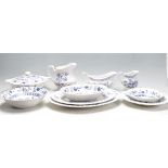 BLUE AND WHITE DINNER SERVICE BY J & G MEAKIN IN BLUE NORDIC PATTERN