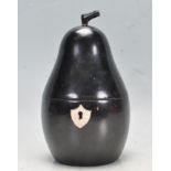 GEORGIAN STYLE EBONISED WOOD TEA CADDY IN THE SHAPE OF A PEAR.