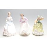 COLLECTION OF THREE VINTAGE POLYCHROME PORCELAIN FIGURINES