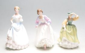 COLLECTION OF THREE VINTAGE POLYCHROME PORCELAIN FIGURINES