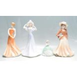 COLLECTION OF FOUR CERAMIC FIGURINES
