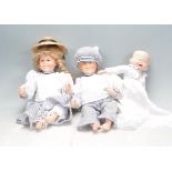 THREE PORCELAIN FACE DOLLS