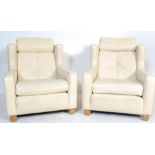 20TH CENTURY DANISH INSPIRED CREAM LEATHER ARMCHAIRS