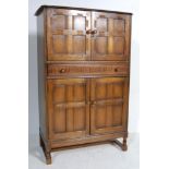 MID CENTURY OAK COCKTAIL CABINET