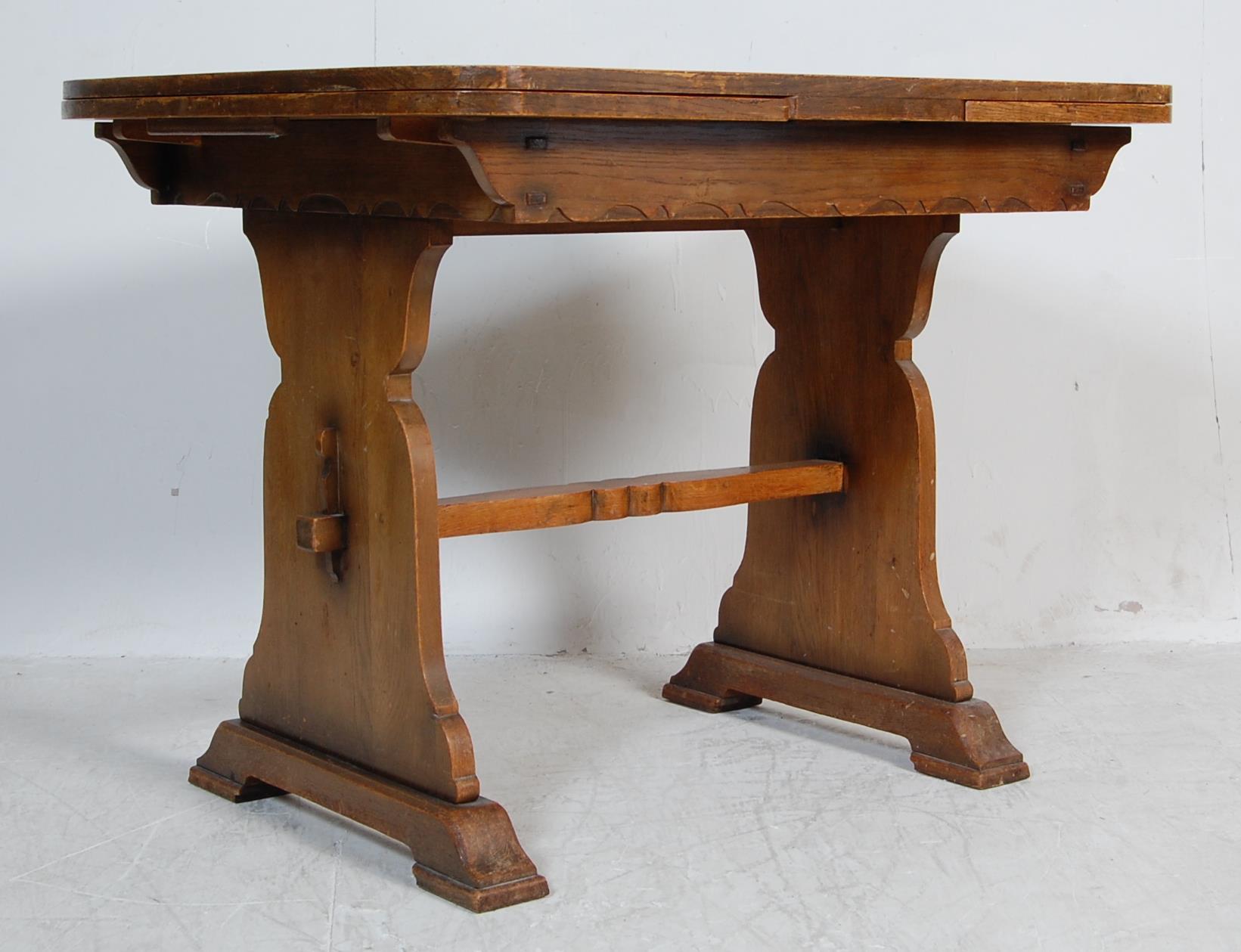 1940’S OAK EXTENDING DRAW LEAF DINING TABLE