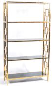 ATTRIBUTED TO ROMEO REGA - BRASS & GLASS ROOM DIVIDER BOOKCASE