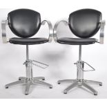 REM - MATCHING PAIR OF ADJUSTABLE BARBER'S ARMCHAIRS