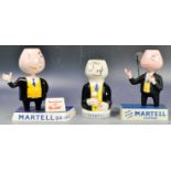 COLLECTION OF MARTELL COGNAC ADVERTISING FIGURES