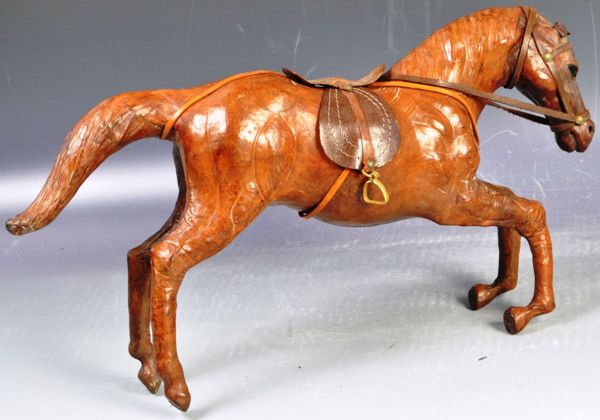 ANTIQUE STYLE LEATHER HORSE FIGURE IN THE LIBERTY MANNER