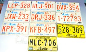 COLLECTION OF RETRO NORTH AMERICAN ALUMINIUM LICENSE PLATES