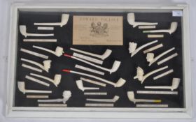 EDWARD POLLOCK - CASED SET DISPLAY OF CLAY PIPES