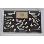 EDWARD POLLOCK - CASED SET DISPLAY OF CLAY PIPES