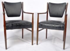 MATCHING PAIR OF TEAK AND LEATHER UPHOLSTERED ARMCHAIRS