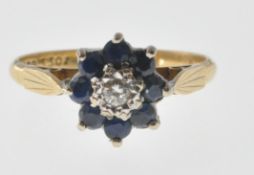 18CT GOLD DIAMOND AND SAPPHIRE CLUSTER RING