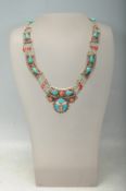 TIBETAN STAMPED 925 SILVER TURQUOISE AND CORAL COLLAR NECKLACE.