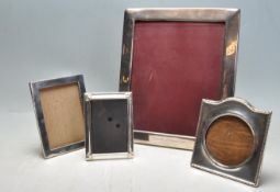 FOUR SILVER / SILVER PLATED PHOTO FRAMES