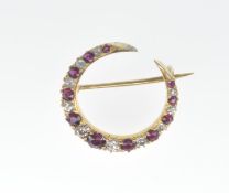 ANTIQUE GOLD DIAMOND AND RUBY CRESCENT BROOCH