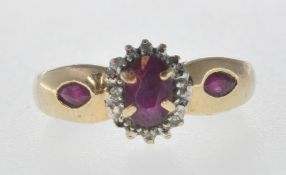 HALLMARKED 9CT GOLD PINK STONE RING.