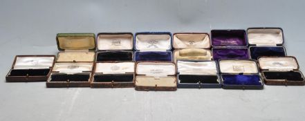 COLLECTION OF VINTAGE TOOLED LEATHER JEWELLERY BOXES.