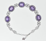STAMPED 925 SILVER AMETHYST AND MARCASITE BRACELET.