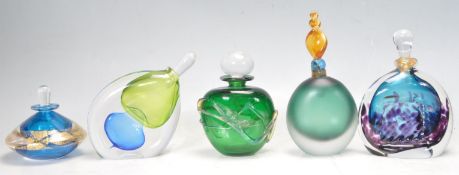 FOUR SIGNED STUDIO ART GLASS BOTTLES
