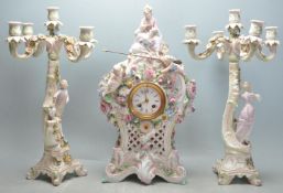 19TH CENTURY FRENCH REPRODUCTION THREE PIECE CLOCK AND CANDLESTICK SET.