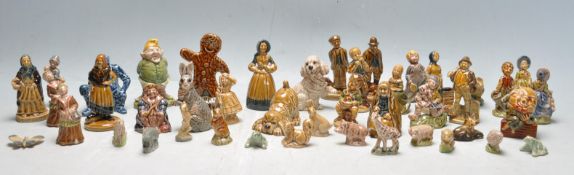LARGE COLLECTION OF VINTAGE WADE CERAMIC FIGURINES