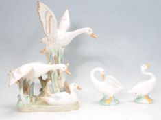 GROUP OF CERAMIC PORCELAIN DUCK FIGURINE BY REX VALENCIA