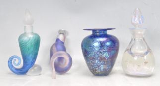FOUR STUDIO ART GLASS VASES AND BOTTLES